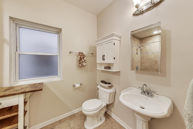 5143 S Greenwood Ave Unit 1, Chicago, IL 60615 - bathroom with tile patterned floors and a shower