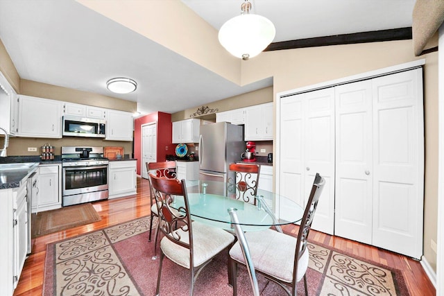 1136 S Naper Blvd, Naperville, IL 60540 - dining space featuring light wood finished floors