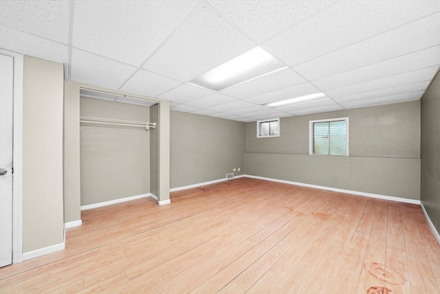 1136 S Naper Blvd, Naperville, IL 60540 - below grade area with wood finished floors, a paneled ceiling, and baseboards