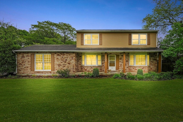 1136 S Naper Blvd, Naperville, IL 60540 - traditional-style home with a yard, brick siding, and a porch