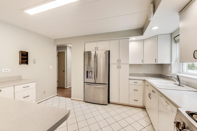 6478 N NW Hwy Unit 1, Chicago, IL 60631 - kitchen featuring stainless steel fridge with ice dispenser, a sink, range, light countertops, and dishwasher