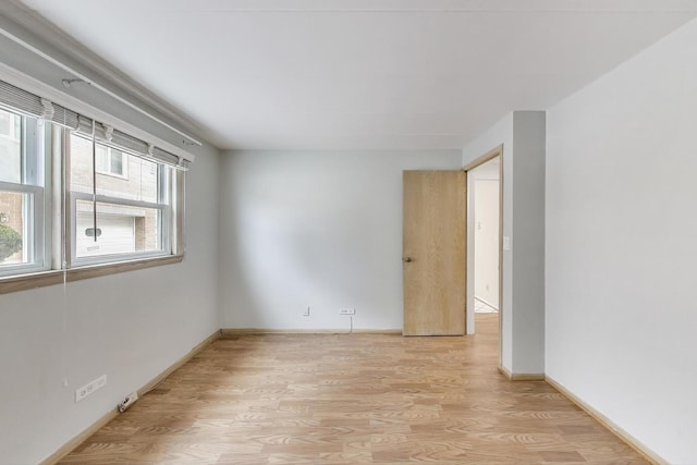 6478 N NW Hwy Unit 1, Chicago, IL 60631 - empty room featuring light wood-style flooring and baseboards