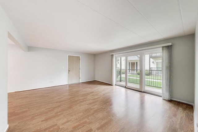 6478 N NW Hwy Unit 1, Chicago, IL 60631 - unfurnished room featuring light wood finished floors and baseboards