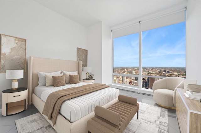401 N Wabash Ave Unit 51C, Chicago, IL 60611 - bedroom with tile patterned flooring, a city view, and a wall of windows