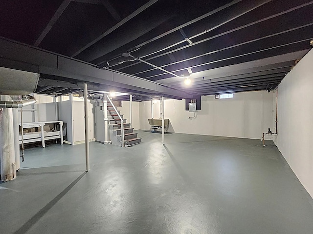 673 Slade Ave, Elgin, IL 60120 - basement with electric panel and stairway