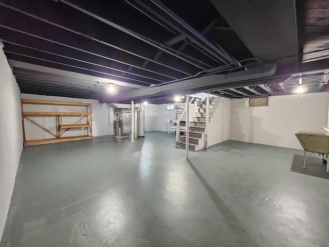 673 Slade Ave, Elgin, IL 60120 - unfinished below grade area with stairs, water heater, and a sink