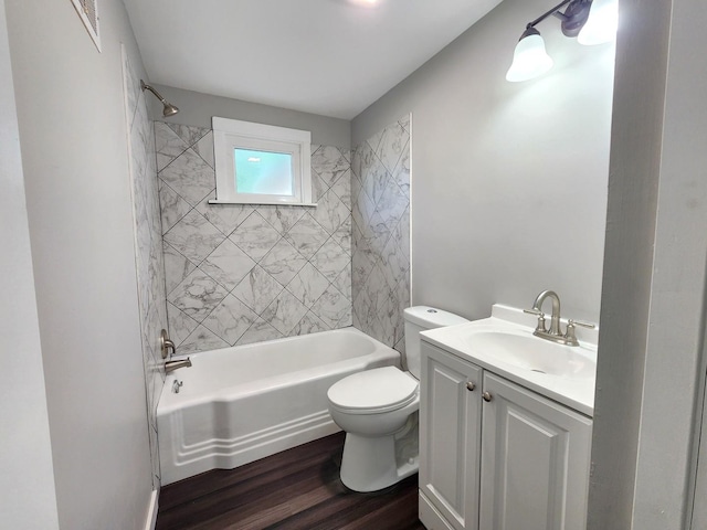 673 Slade Ave, Elgin, IL 60120 - bathroom featuring toilet, vanity, shower / bath combination, and wood finished floors