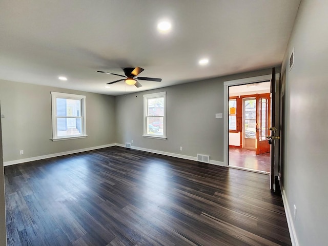 673 Slade Ave, Elgin, IL 60120 - spare room featuring healthy amount of natural light, recessed lighting, baseboards, a ceiling fan, and dark wood-type flooring
