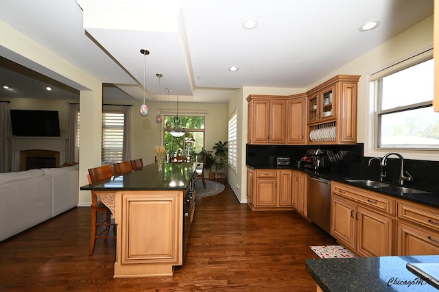 328 Erie Cir, Bloomingdale, IL 60108 - kitchen featuring a sink, dishwasher, a breakfast bar area, dark wood-style floors, and glass insert cabinets