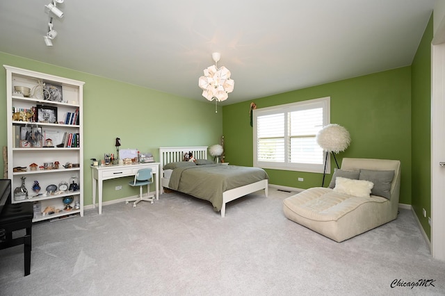 328 Erie Cir, Bloomingdale, IL 60108 - bedroom featuring carpet flooring, baseboards, and a chandelier