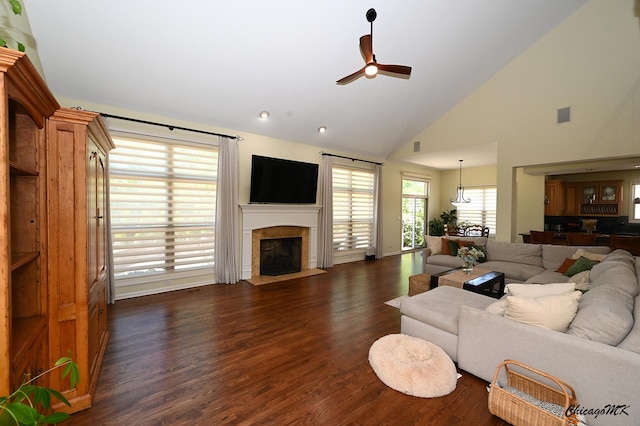 328 Erie Cir, Bloomingdale, IL 60108 - living area featuring a ceiling fan, dark wood-style floors, a fireplace with flush hearth, high vaulted ceiling, and recessed lighting
