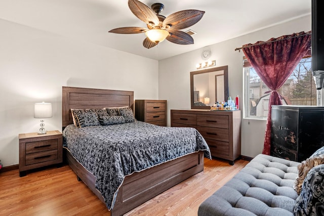 125 Seton Pl, Streamwood, IL 60107 - bedroom with light wood-style floors, baseboards, and ceiling fan