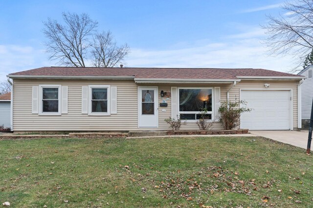 125 Seton Pl, Streamwood, IL 60107 - ranch-style home featuring a garage, driveway, and a front lawn