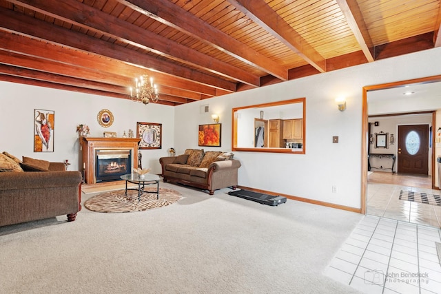 125 Seton Pl, Streamwood, IL 60107 - tiled living area with wood ceiling with exposed beams, baseboards, carpet floors, a glass covered fireplace, and a chandelier