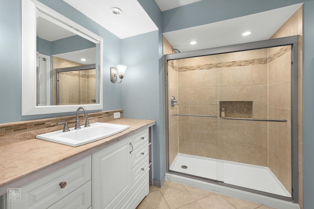820 N Dexter Ln, Hoffman Estates, IL 60169 - full bath with tile patterned floors, a stall shower, vanity, and decorative backsplash