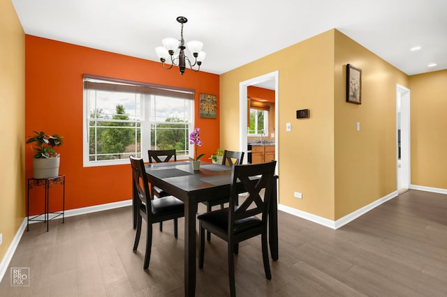 820 N Dexter Ln, Hoffman Estates, IL 60169 - dining area featuring a chandelier, wood finished floors, baseboards, and recessed lighting