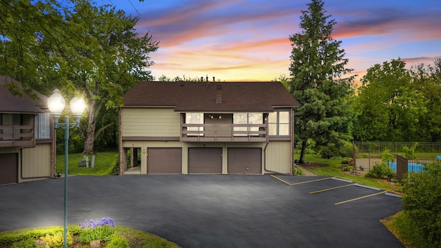 5 Cobblestone Ct Unit C, Palos Hills, IL 60465 - view of front facade featuring a balcony and roof with shingles