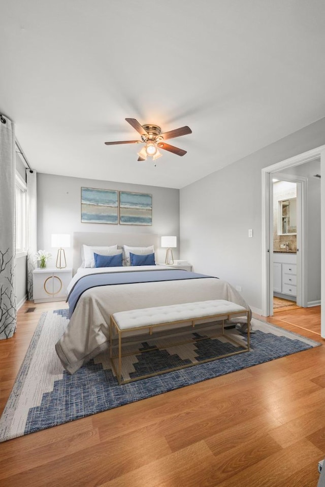 5 Cobblestone Ct Unit C, Palos Hills, IL 60465 - bedroom featuring light wood-style flooring, baseboards, and a ceiling fan