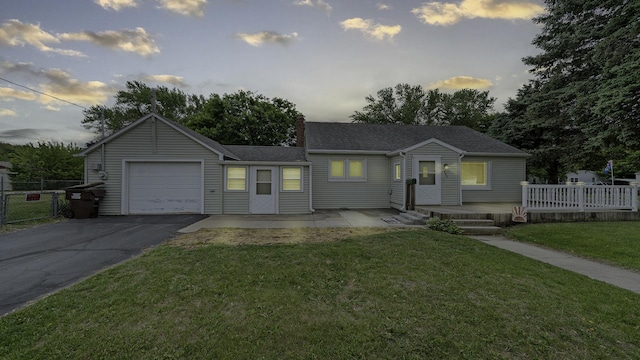 450 Gayton Ave, South Beloit, IL 61080 - view of front of house featuring an attached garage, driveway, and roof with shingles