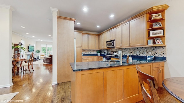 4232 Linden Tree Ln, Glenview, IL 60026 - kitchen with stainless steel appliances, a sink, open shelves, light wood-type flooring, and recessed lighting
