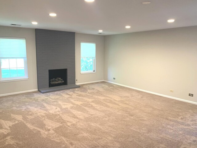 1422 W Orchard Pl Unit B, Arlington Heights, IL 60005 - unfurnished living room with carpet, recessed lighting, baseboards, and a fireplace