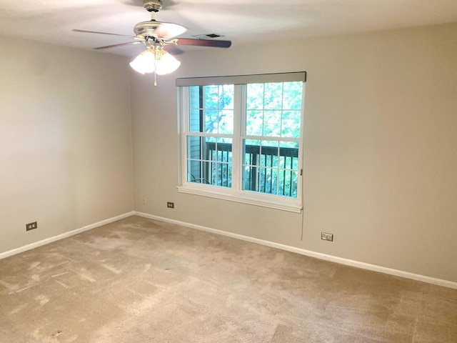 1422 W Orchard Pl Unit B, Arlington Heights, IL 60005 - unfurnished room featuring light carpet, ceiling fan, and baseboards