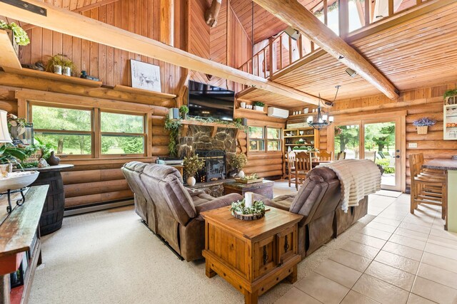 310 N Oak Ln, Dixon, IL 61021 - living area featuring rustic walls, a baseboard heating unit, a fireplace, a chandelier, and a wall mounted AC