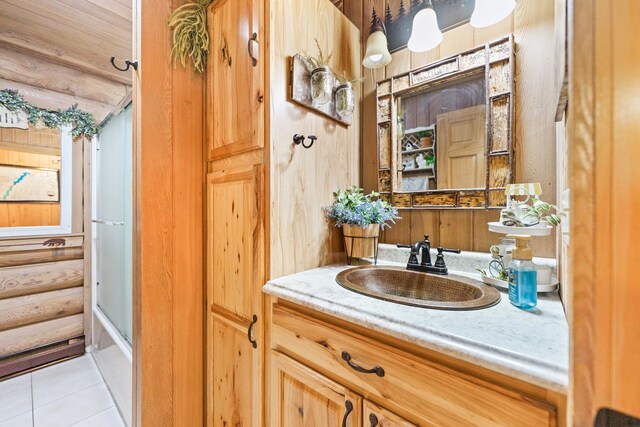 310 N Oak Ln, Dixon, IL 61021 - bathroom featuring vanity, tile patterned floors, and shower / tub combination