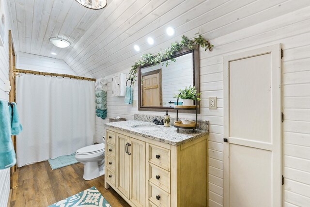 310 N Oak Ln, Dixon, IL 61021 - full bathroom with lofted ceiling, vanity, wooden ceiling, wood finished floors, and toilet