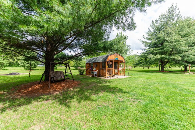 310 N Oak Ln, Dixon, IL 61021 - view of green lawn with an outbuilding