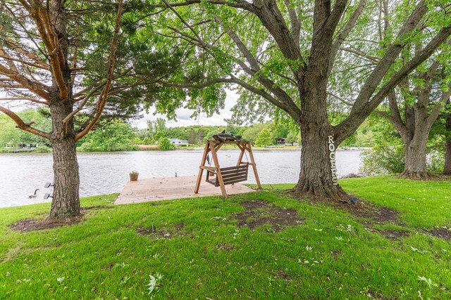 310 N Oak Ln, Dixon, IL 61021 - dock area featuring a water view and a yard