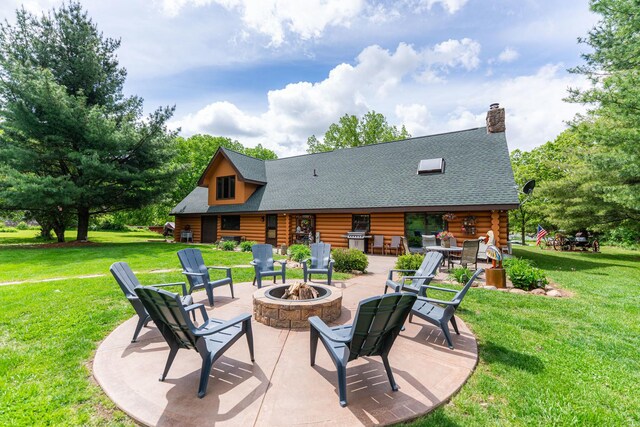 310 N Oak Ln, Dixon, IL 61021 - view of patio featuring an outdoor fire pit