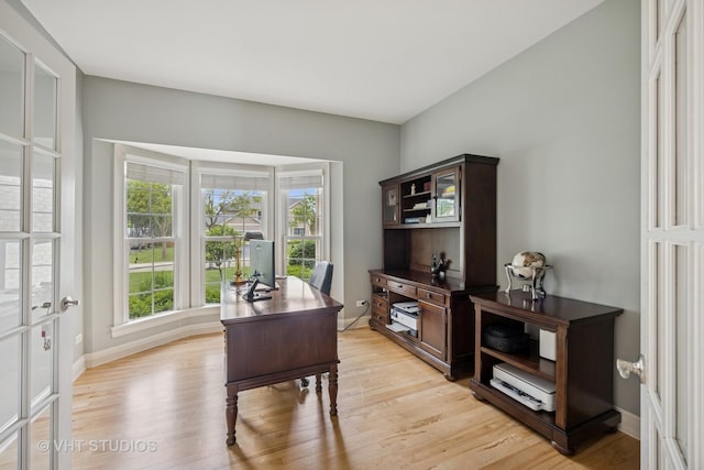 651 Clover Dr, Algonquin, IL 60102 - office area with light wood-style flooring and baseboards