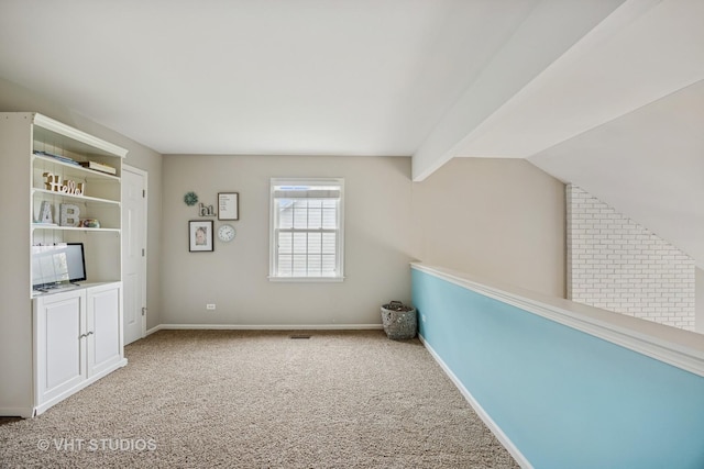 651 Clover Dr, Algonquin, IL 60102 - interior space featuring carpet floors, baseboards, and lofted ceiling