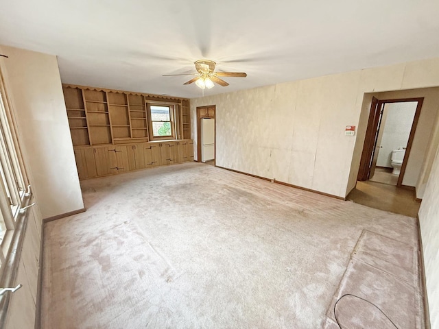 942 W Villa Dr, Des Plaines, IL 60016 - empty room featuring a ceiling fan and light carpet