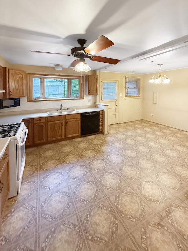 942 W Villa Dr, Des Plaines, IL 60016 - kitchen with black appliances, a sink, light countertops, and brown cabinets