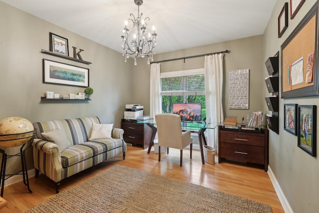 2156 Red Maple Ln, Aurora, IL 60502 - office area with a chandelier, light wood-type flooring, and baseboards