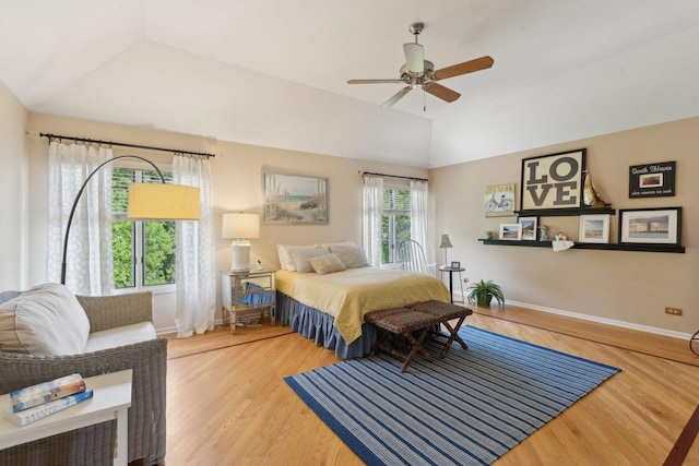 2156 Red Maple Ln, Aurora, IL 60502 - bedroom with lofted ceiling, baseboards, wood finished floors, and a ceiling fan
