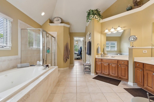 2156 Red Maple Ln, Aurora, IL 60502 - bathroom featuring vaulted ceiling, a stall shower, vanity, tile patterned flooring, and a jetted tub