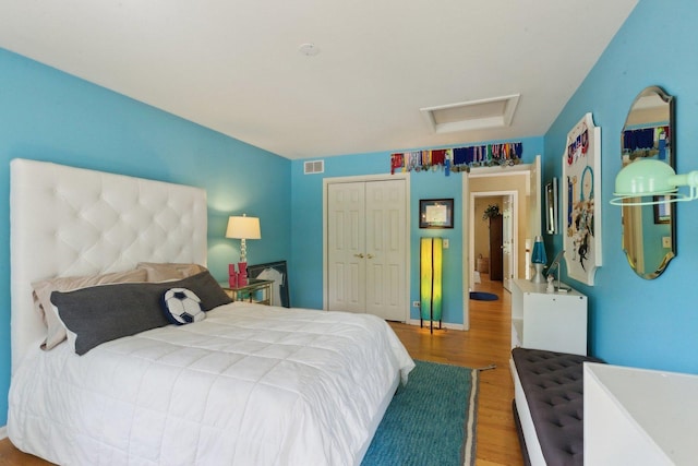 2156 Red Maple Ln, Aurora, IL 60502 - bedroom featuring wood finished floors, a closet, and attic access