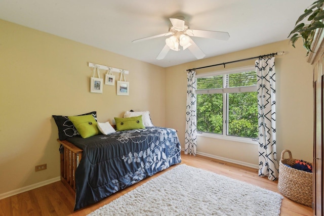 2156 Red Maple Ln, Aurora, IL 60502 - bedroom featuring wood finished floors, baseboards, and a ceiling fan