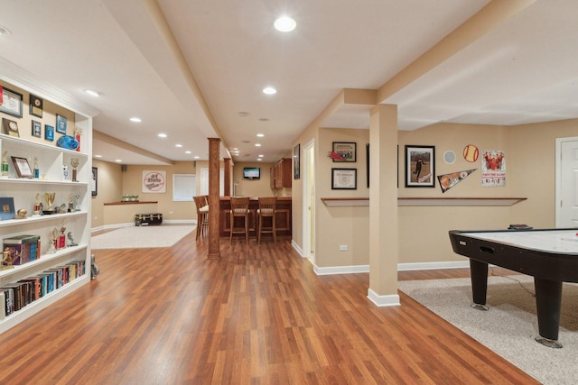 2156 Red Maple Ln, Aurora, IL 60502 - playroom featuring baseboards, wood finished floors, recessed lighting, and bar