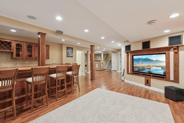 2156 Red Maple Ln, Aurora, IL 60502 - indoor wet bar with light wood-type flooring, stairs, baseboards, and recessed lighting