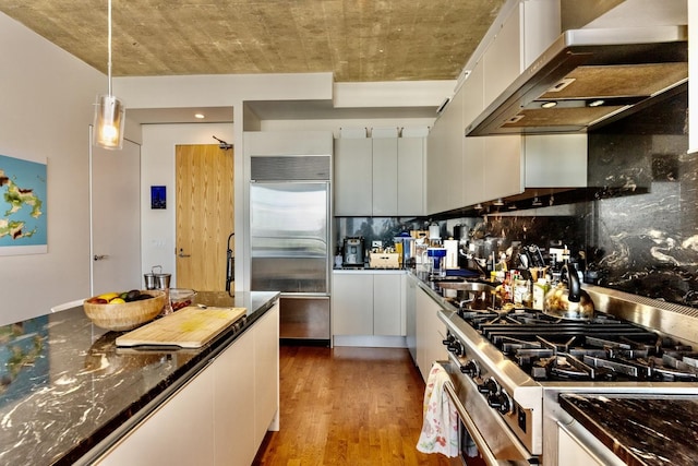 600 N Fairbanks Ct Unit 3306, Chicago, IL 60611 - kitchen with high quality appliances, wall chimney exhaust hood, white cabinets, and wood finished floors