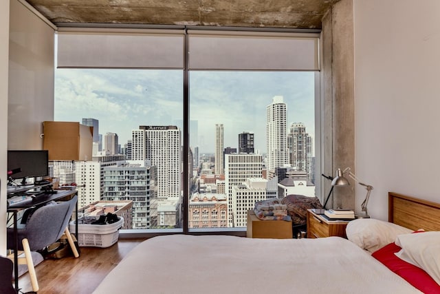 600 N Fairbanks Ct Unit 3306, Chicago, IL 60611 - bedroom featuring wood finished floors, multiple windows, expansive windows, and a view of skyline