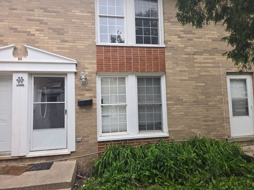 2110 Hebron Ave Unit 2110, Zion, IL 60099 - entrance to property featuring brick siding