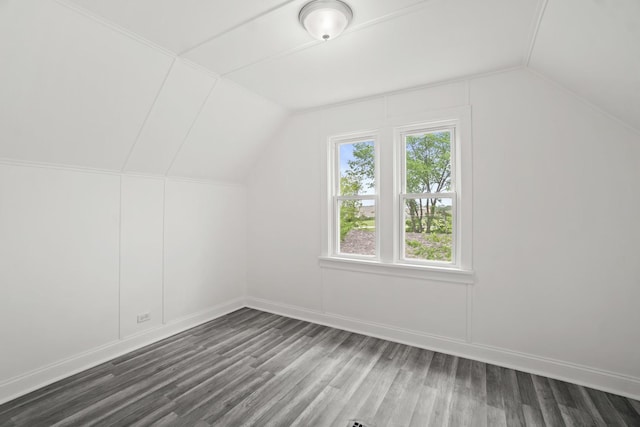 14856 Perry Ave, South Holland, IL 60473 - additional living space with wood finished floors, vaulted ceiling, and baseboards