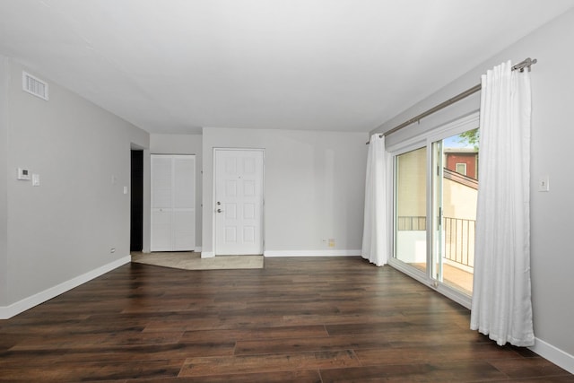 4739 W 105th St Unit 101, Oak Lawn, IL 60453 - empty room featuring dark wood-style flooring and baseboards