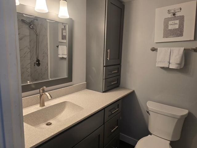 4739 W 105th Pl Unit 101, Oak Lawn, IL 60453 - bathroom featuring vanity, toilet, and a shower
