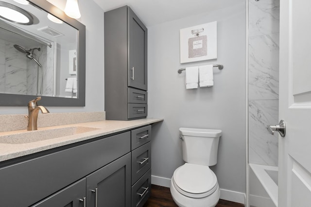 4739 W 105th St Unit 101, Oak Lawn, IL 60453 - full bath with vanity, toilet, baseboards, wood finished floors, and shower / bathtub combination